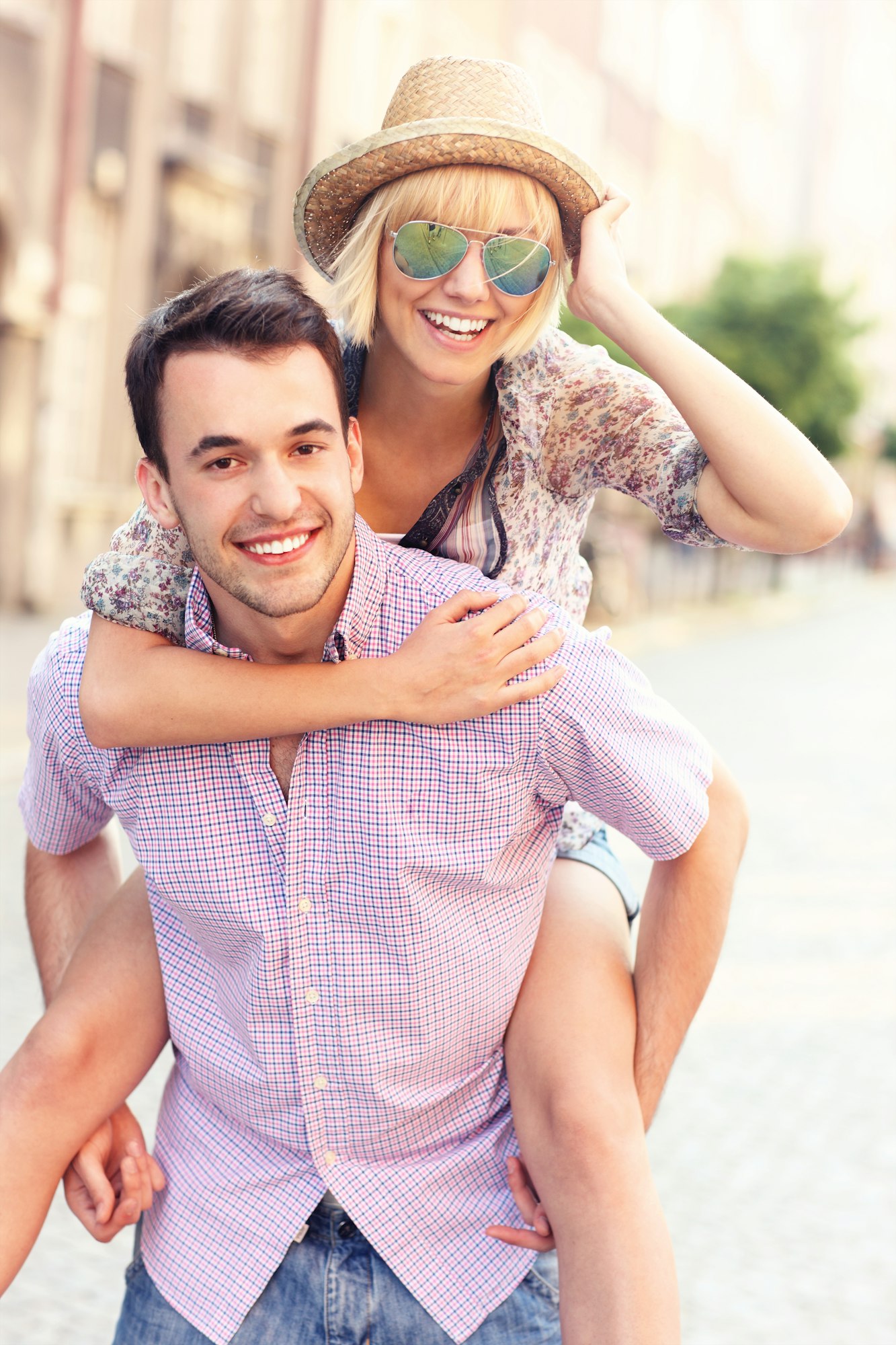 Joyful couple relaxing in the city